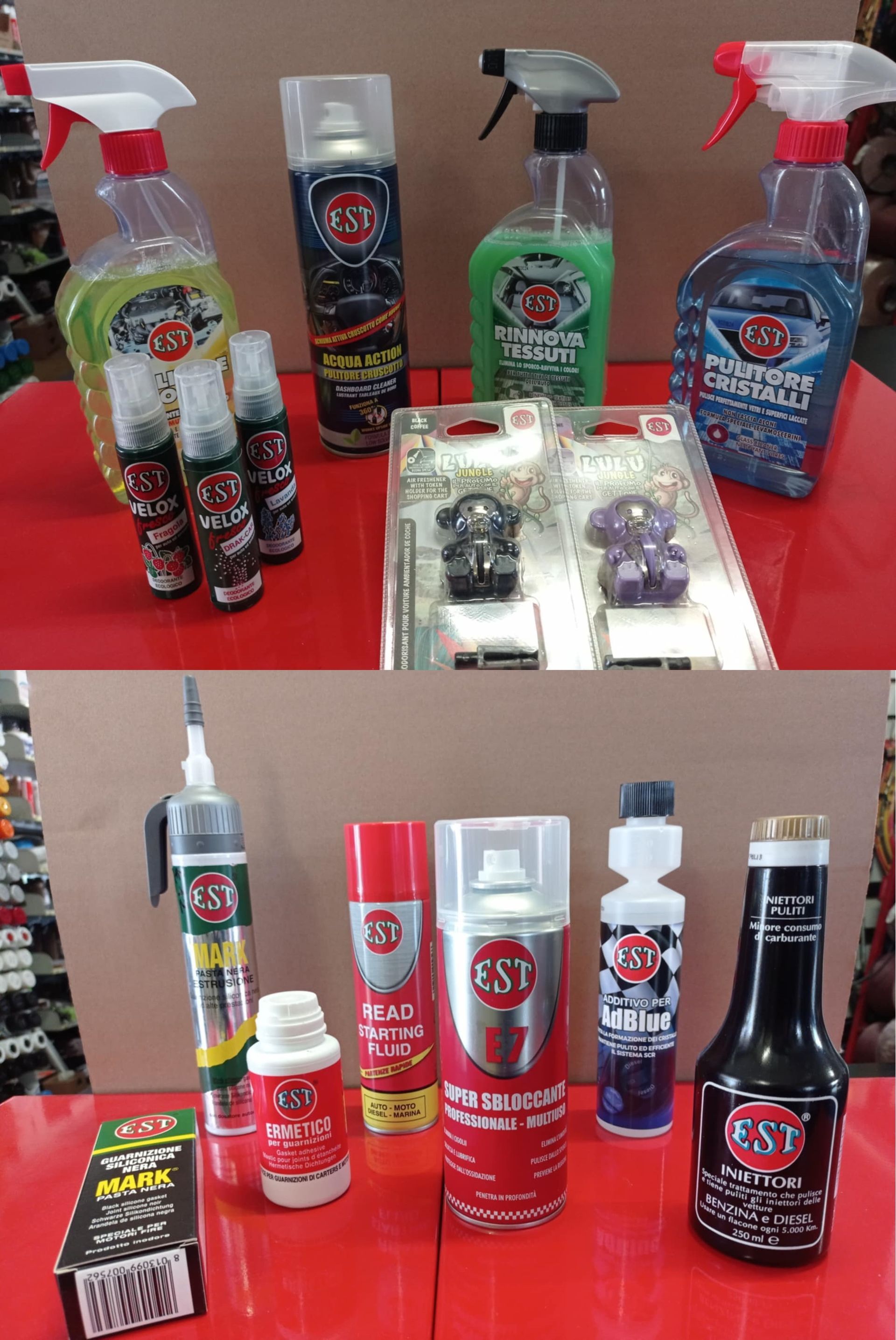 Su un tavolo rosso sono disposti vari prodotti per la pulizia.