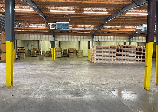 Stacked Wooden Pallets at a Storage — Houston, TX — Quality Pallet