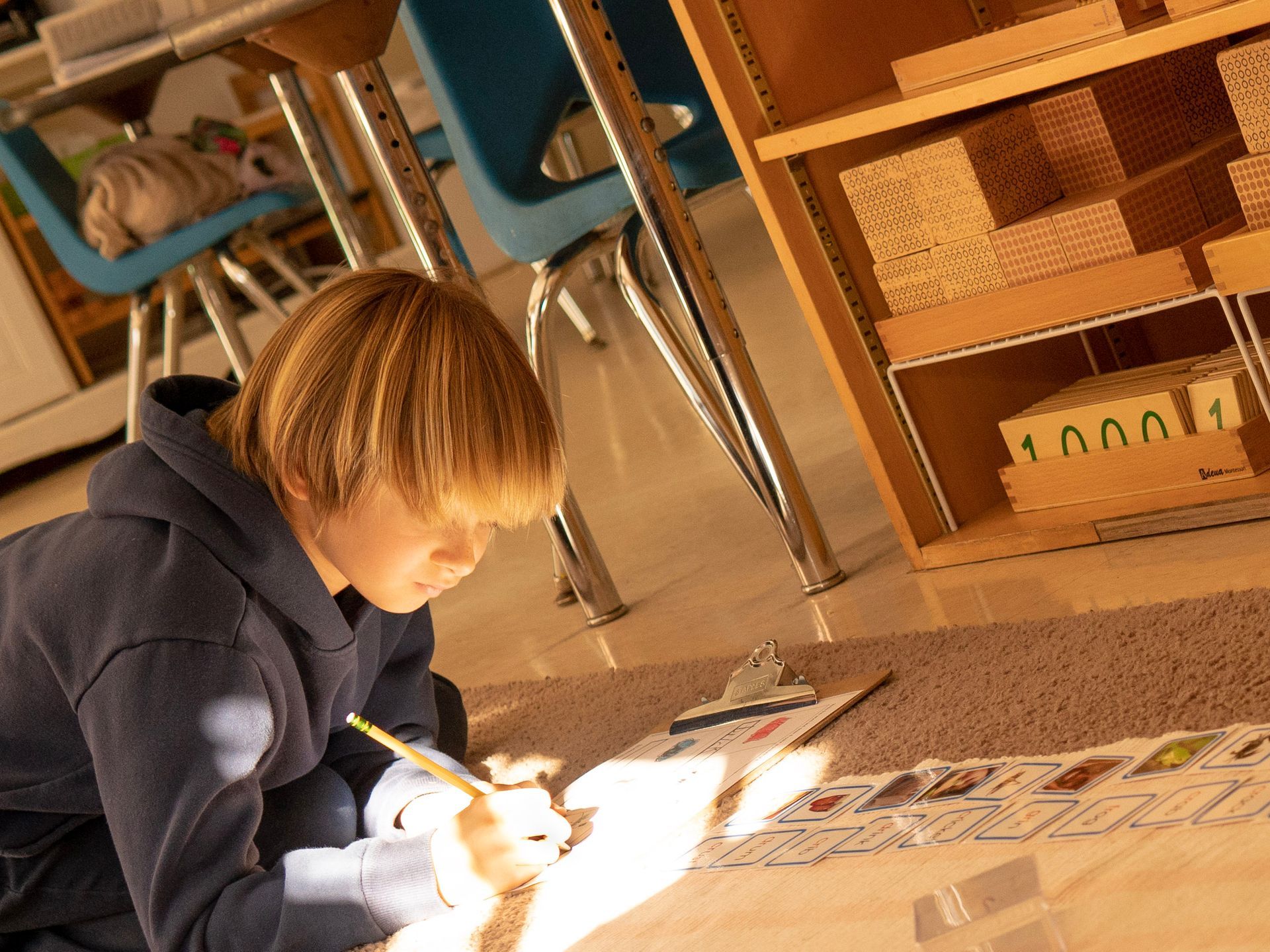 Montessori child working on materials