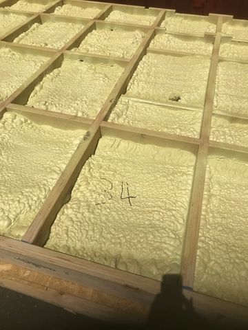 A bunch of foam sitting on top of a wooden floor.