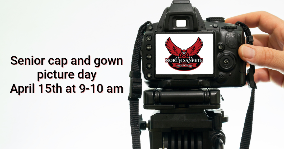 A camera on a tripod displaying a North Sanpete logo on its screen next to text about senior cap and gown pictures.