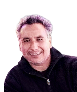 Joseph Cashman smiling with light hair and dark jacket.