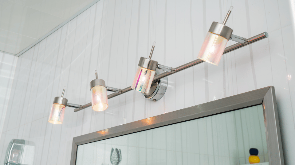 Lamps Above Bathroom Mirror
