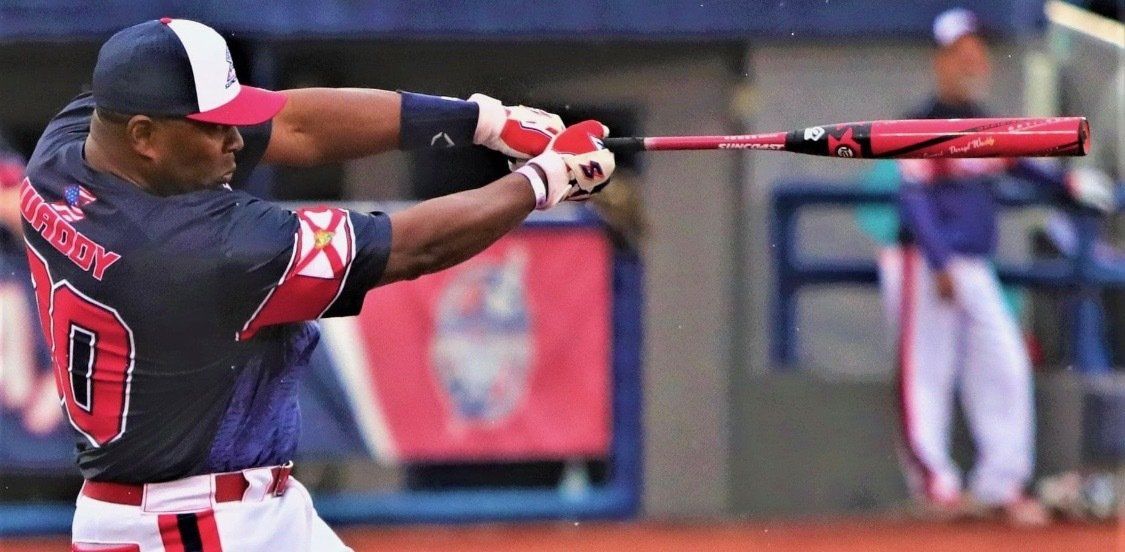 Team Florida batter mid-swing