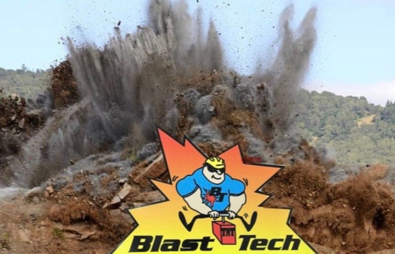 Rock blasting in iron ore quarry.