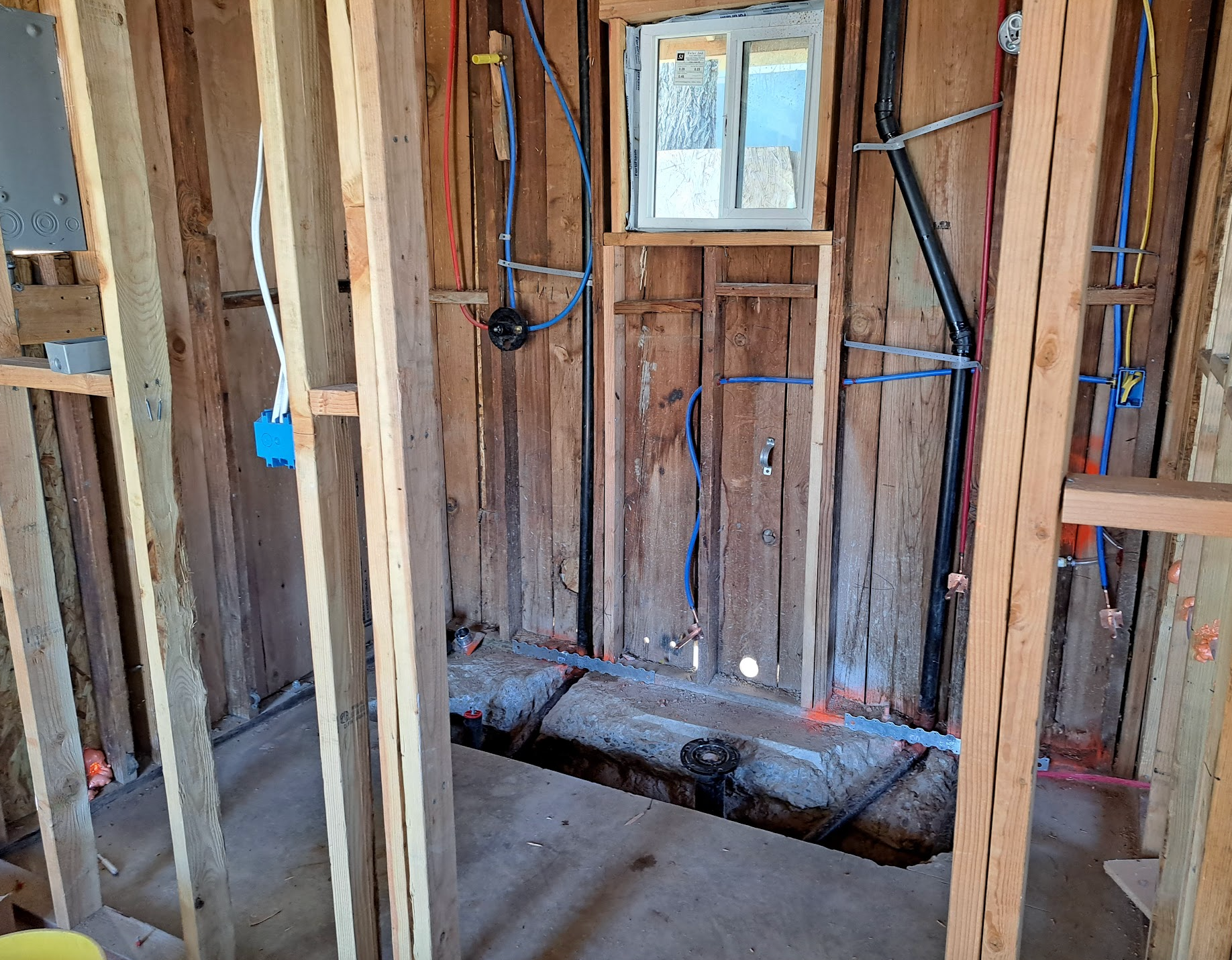 A bathroom is being remodeled in a house.