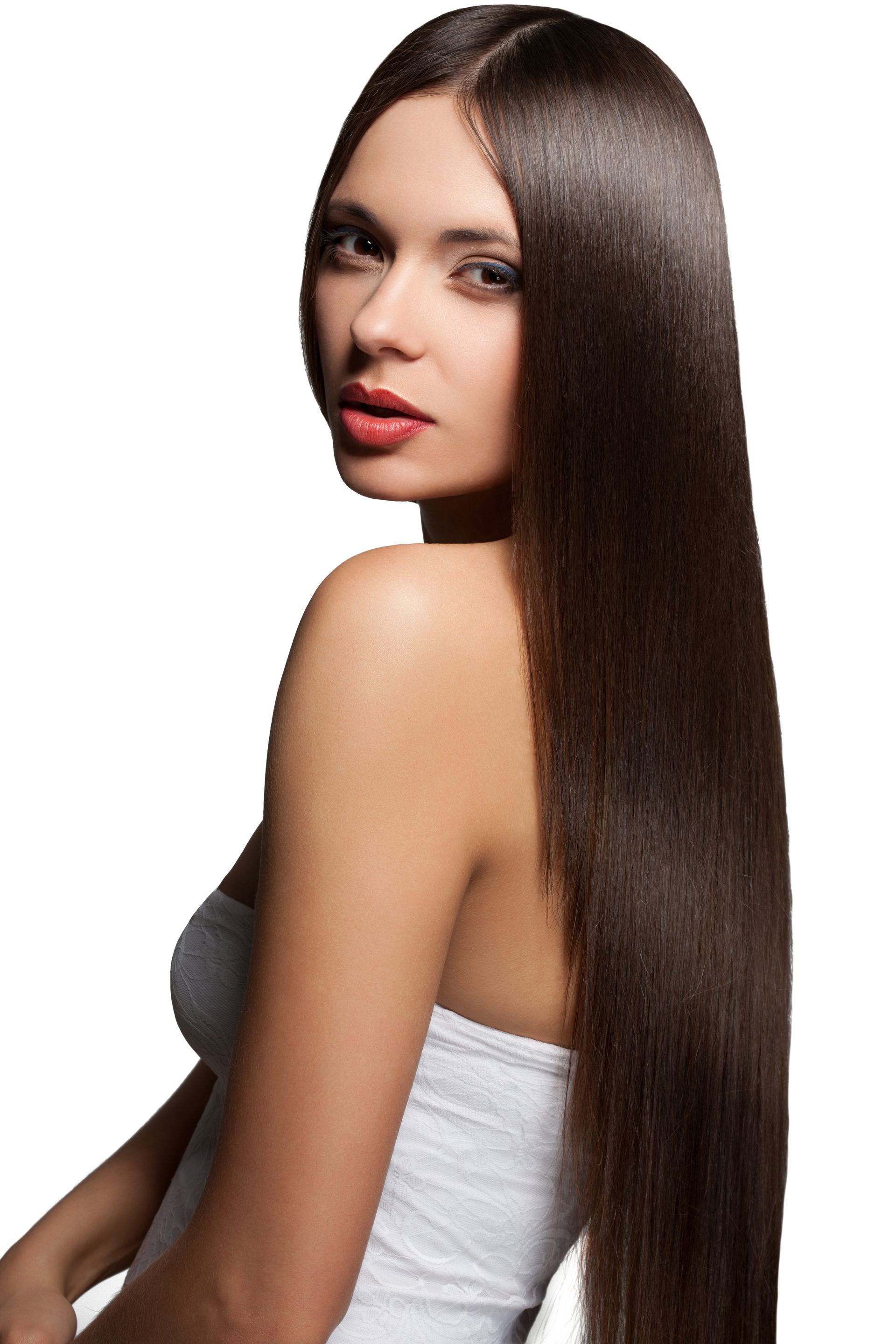 A woman with very long hair is wearing a white strapless top