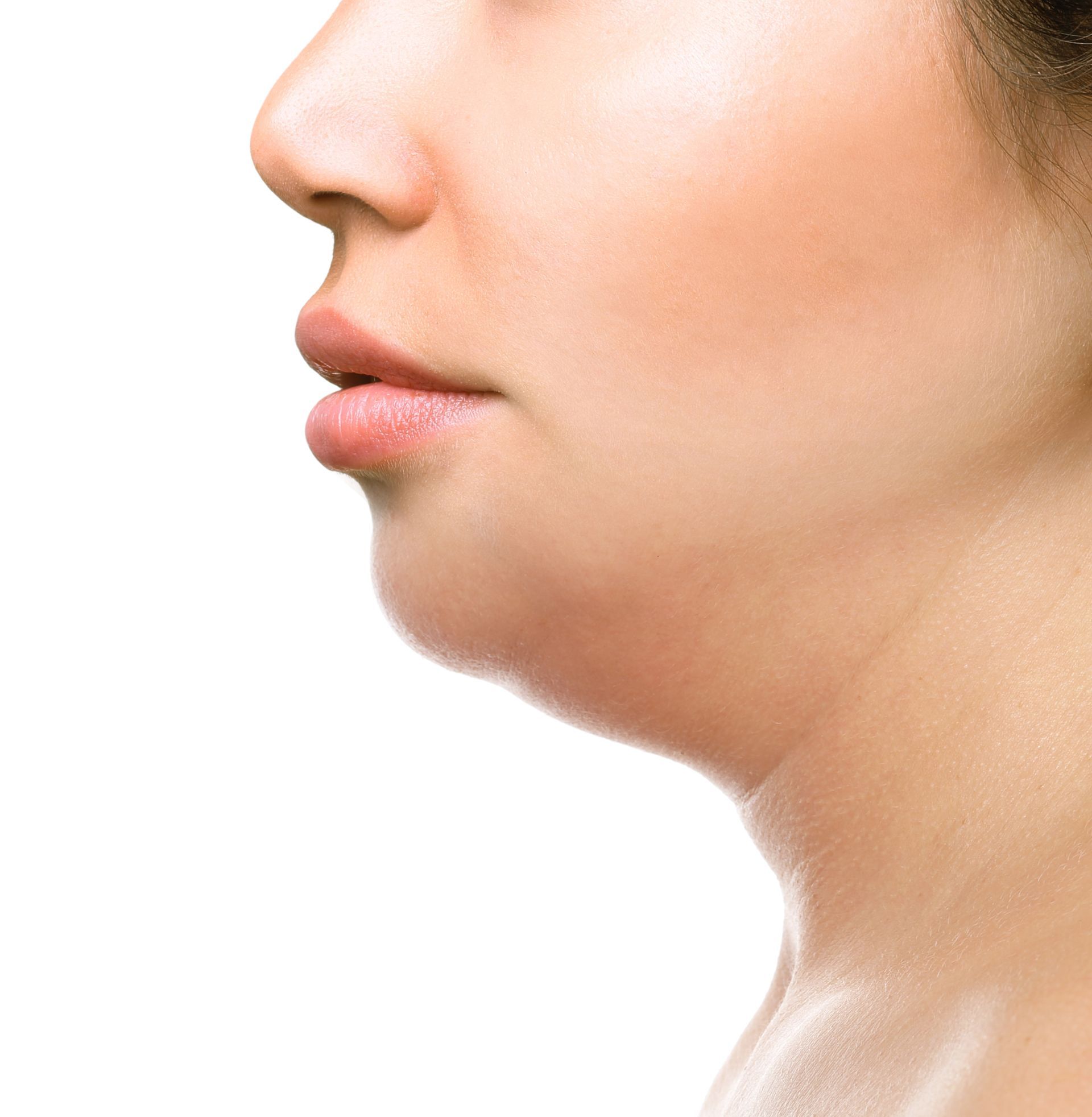 A close up of a woman 's face with a double chin.