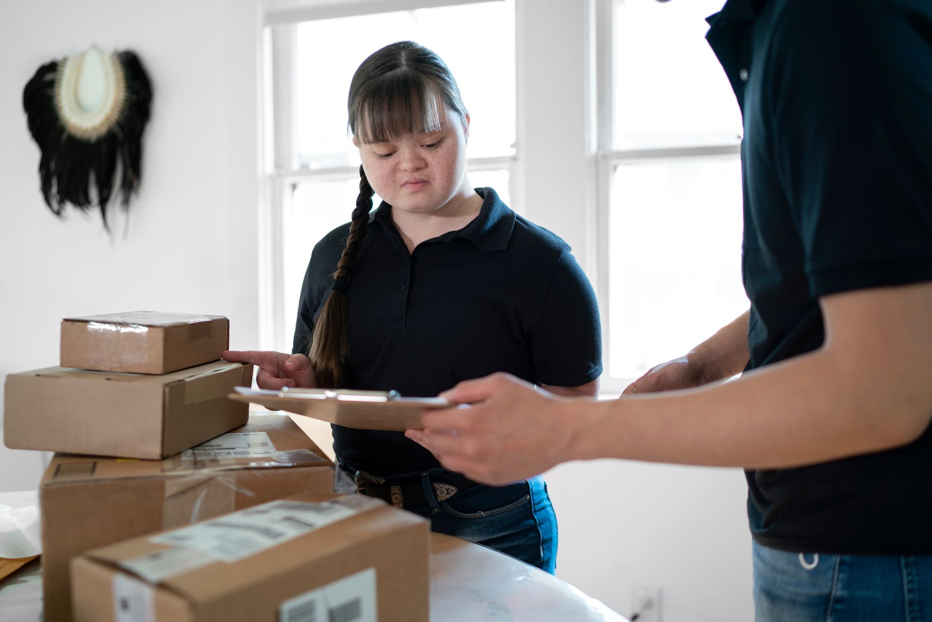 Experts ensuring that all items listed are packed