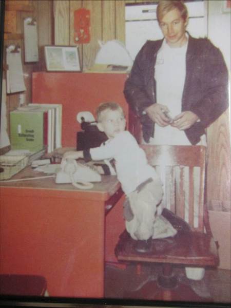 Man and Child at Office — O’Fallon, MO — Mudd Auto Body