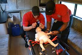 Medical team helping a baby - Medical personnel in Upland, CA