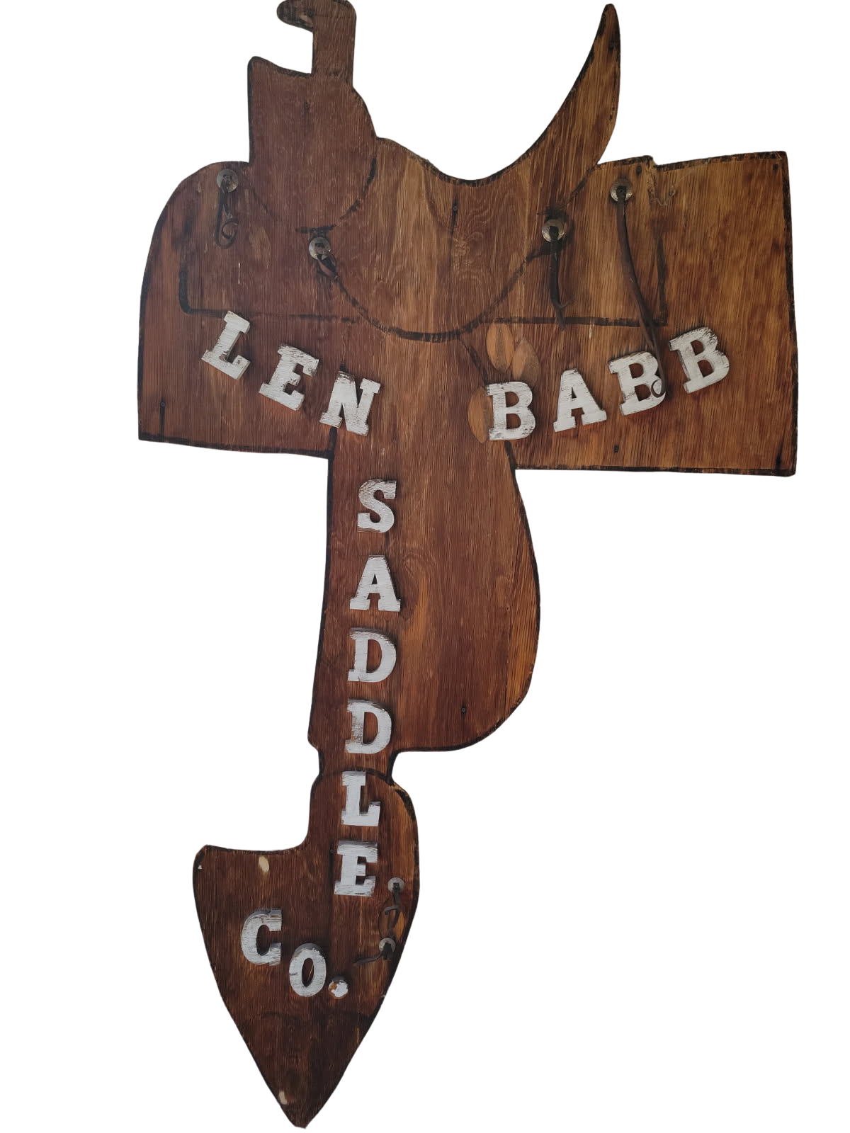 Wooden sign shaped like a fish, painted with &ldquo;LEN BABB SADDLE CO.&rdquo;