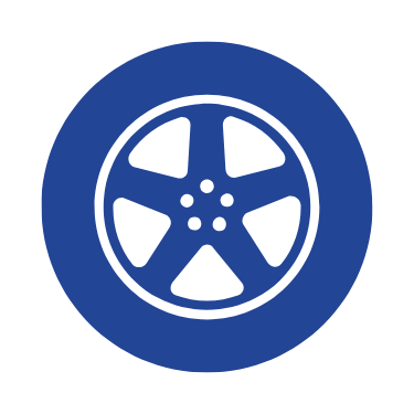 A white icon of a car wheel in a blue circle.
