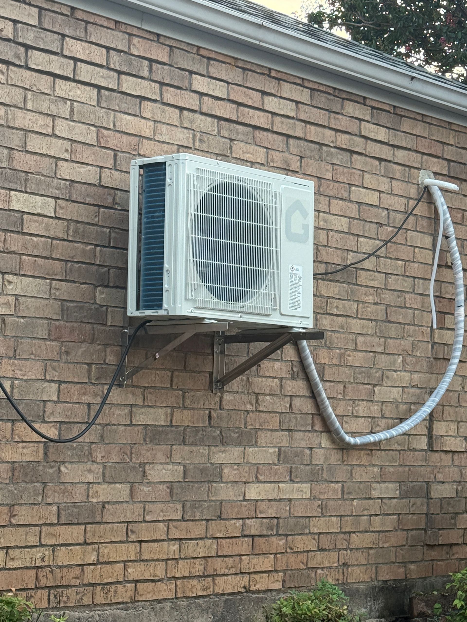 The inside of a moving truck filled with boxes and blankets.