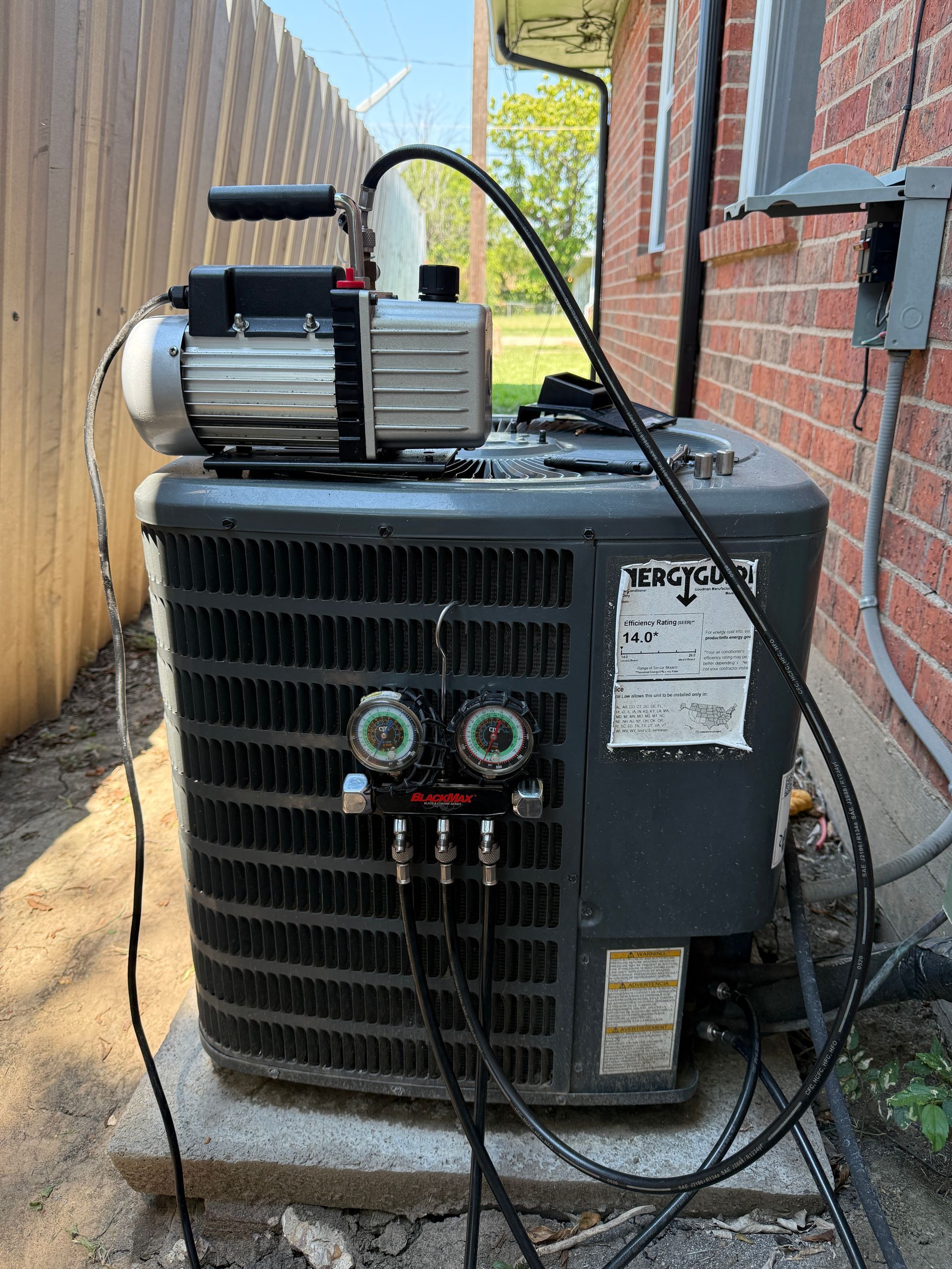 The inside of a moving truck filled with boxes and blankets.