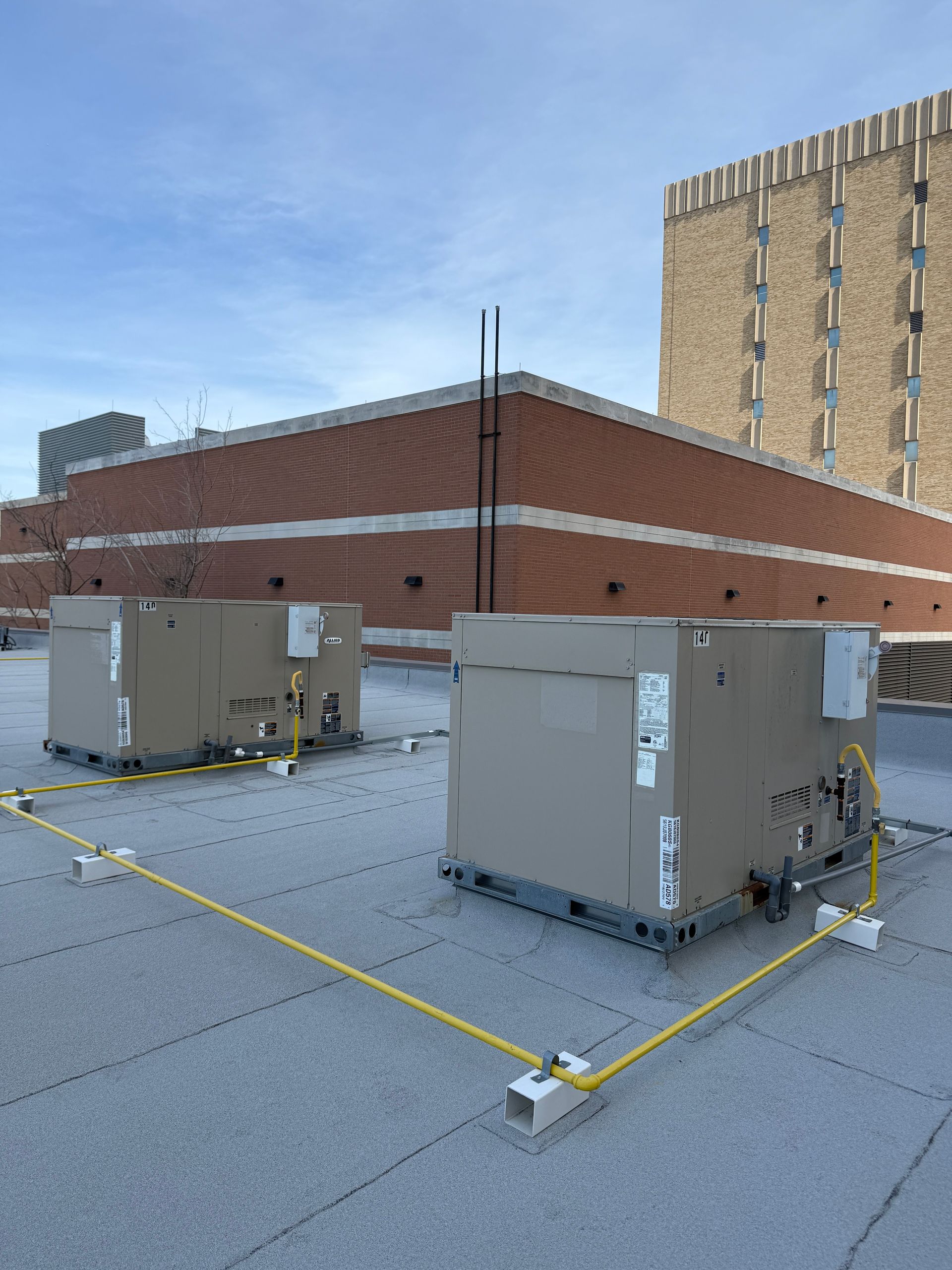 The inside of a moving truck filled with boxes and blankets.