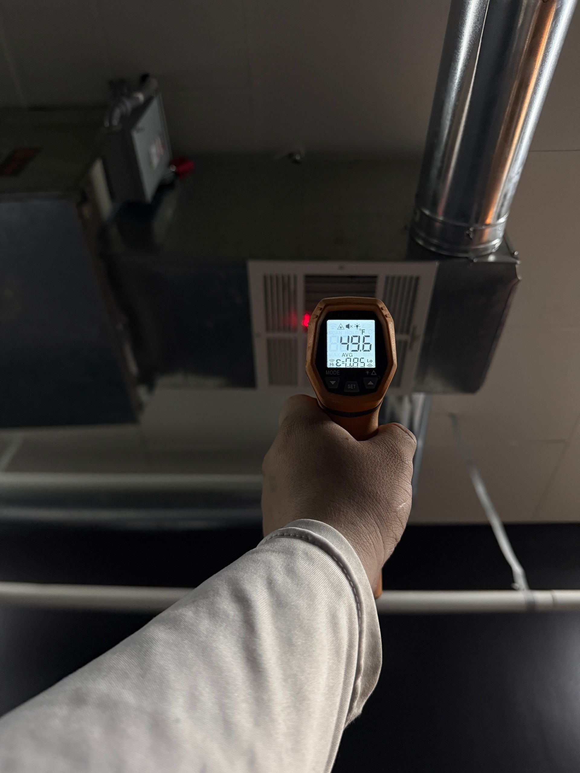 The inside of a moving truck filled with boxes and blankets.