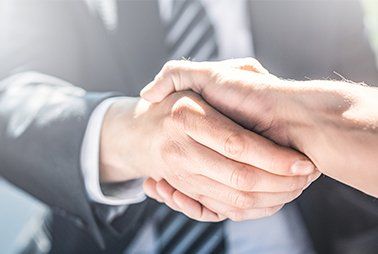 Agent and Client Shaking Hands — Dickson, TN — PFF Insurance