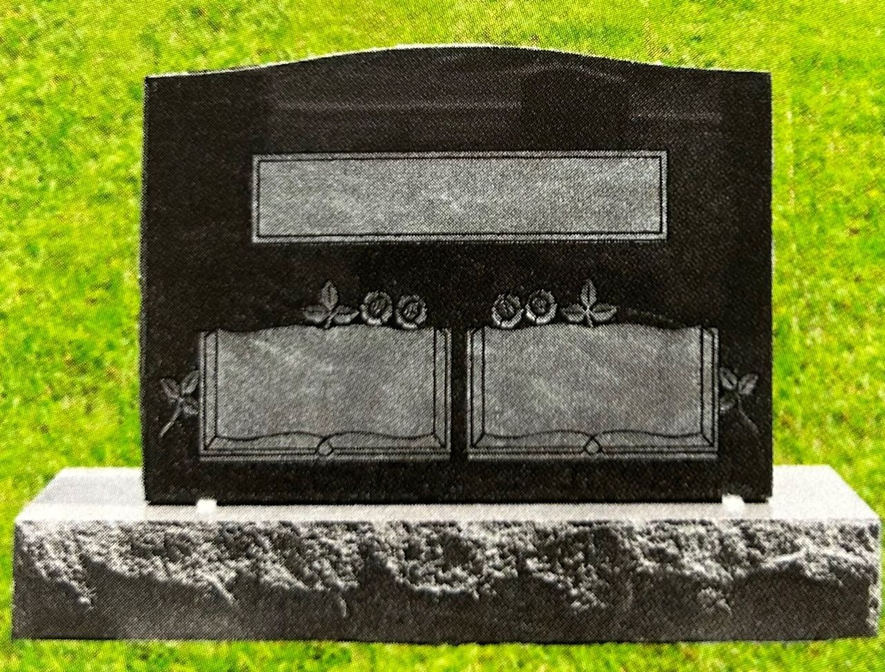 Black granite headstone with blank inscription spaces, set on a stone base, green grass background.