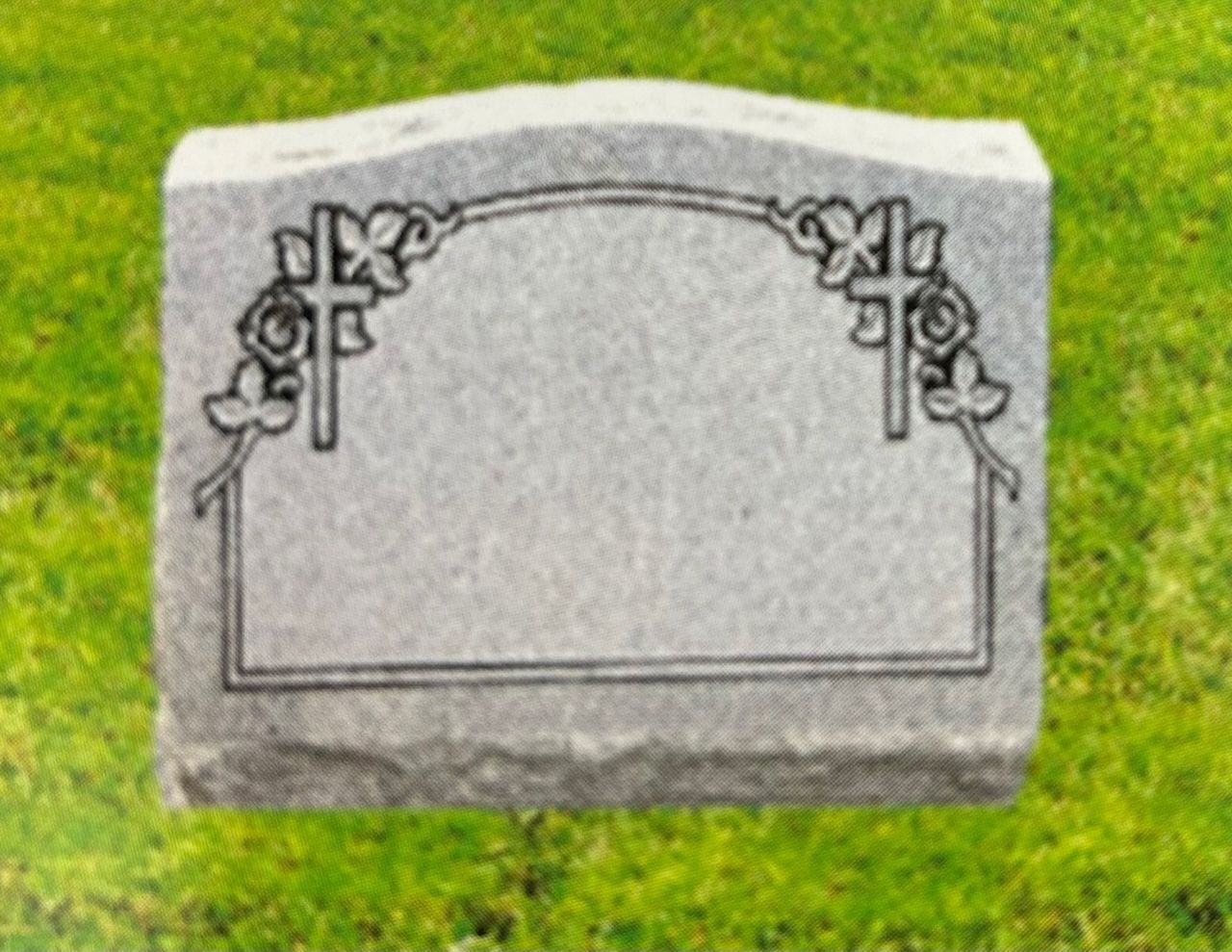 Gray tombstone with cross and rose decorations, blank space for engraving, set in grass.