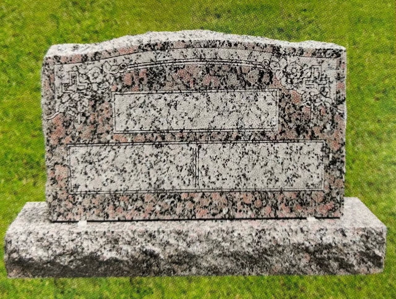 Gray and red granite headstone on green grass.