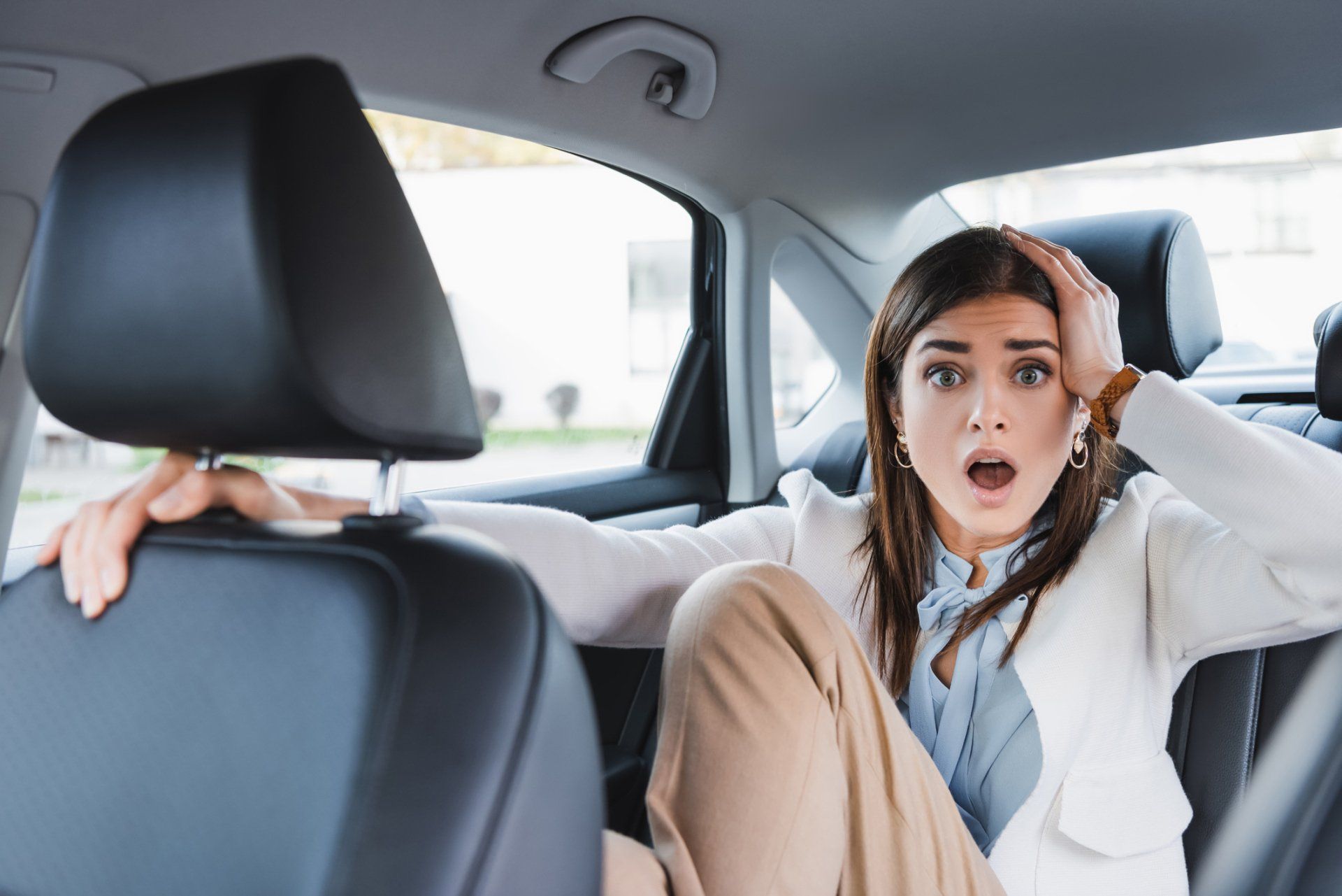 Scared Woman Riding in Car – Washington, DC – Wingfield, Ginsburg & Lipp PC