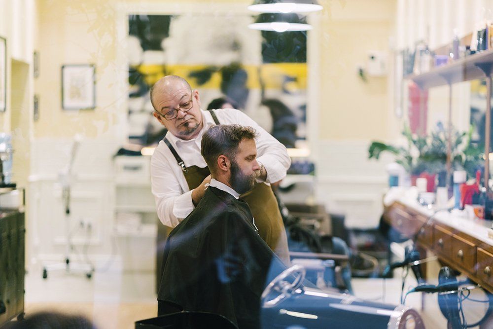 Barber Shaving Man's Beard | Cheyenne, WY | City Barbers & Stylists