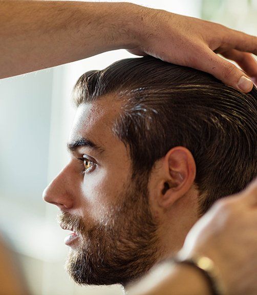 Man with New Hairstyle at Barber Shop | Cheyenne, WY | City Barbers & Stylists