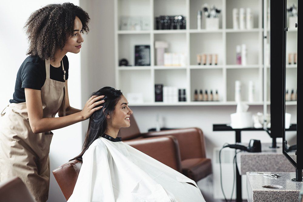 Trying New Hairstyle at Beauty Salon | Cheyenne, WY | City Barbers & Stylists