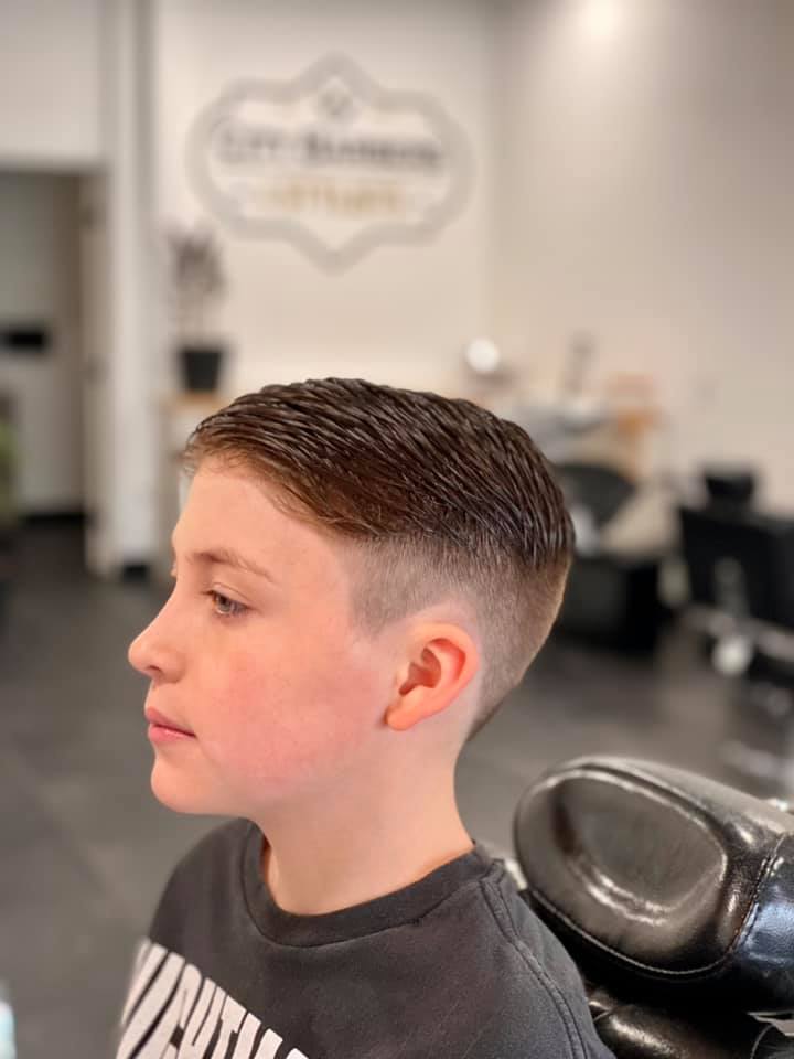 Young Child at the Barbershop | Cheyenne, WY | City Barbers & Stylists
