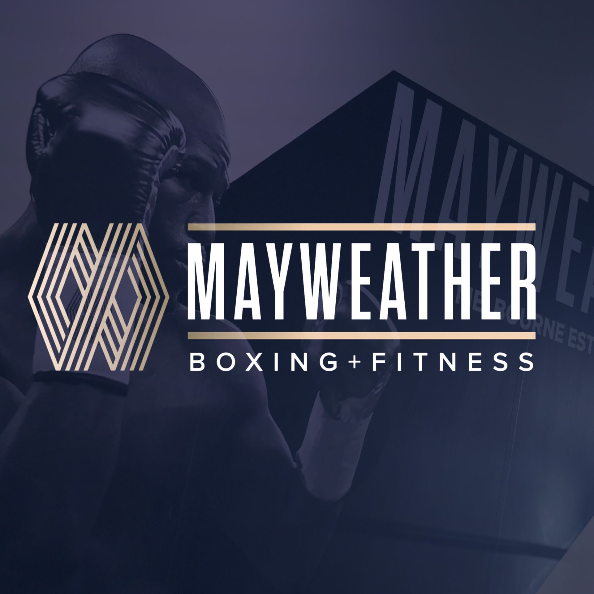 A woman wearing a purple mayweather tank top is standing in a gym.