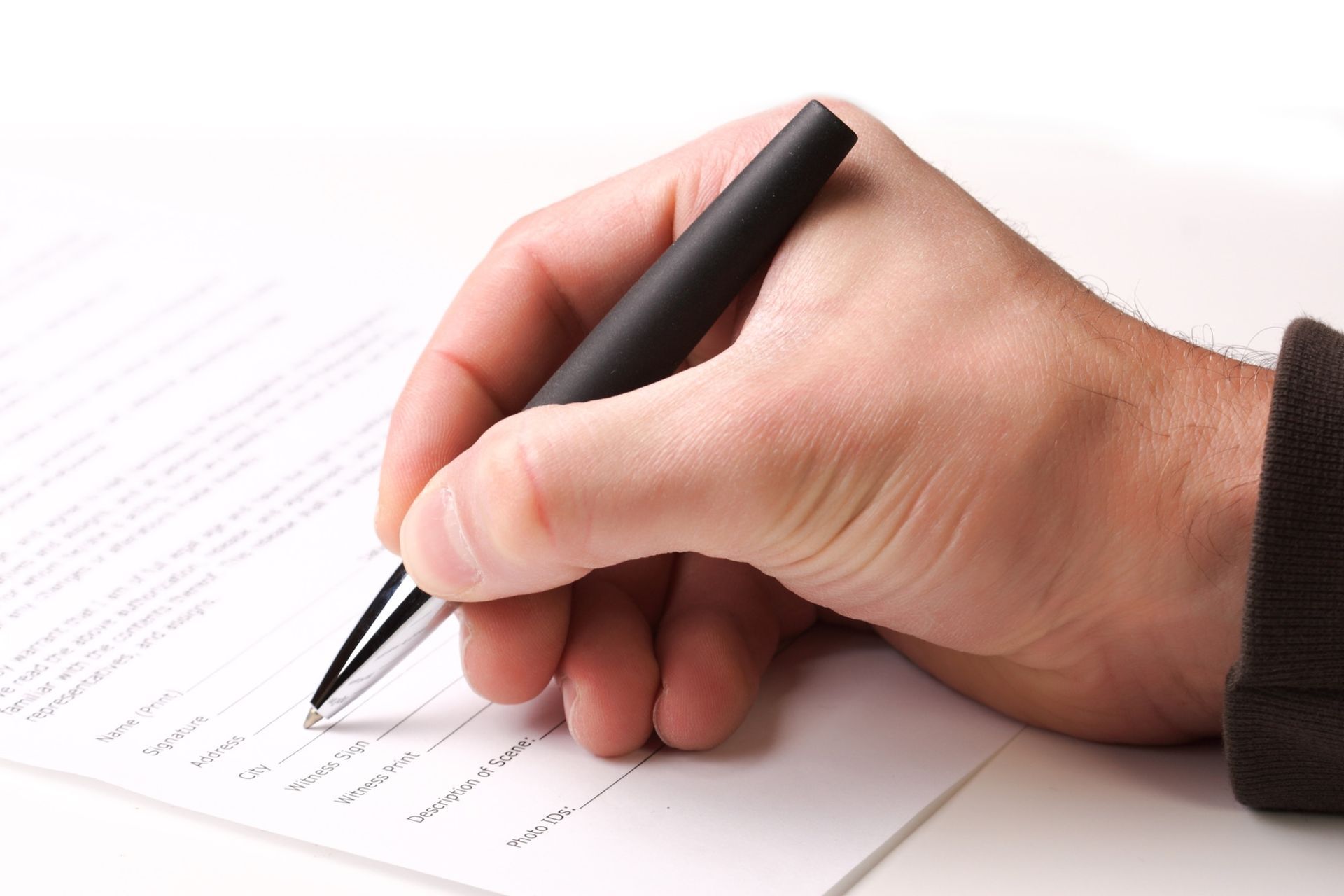 Looking through the vents of an AC unit a fan blade stays motionless