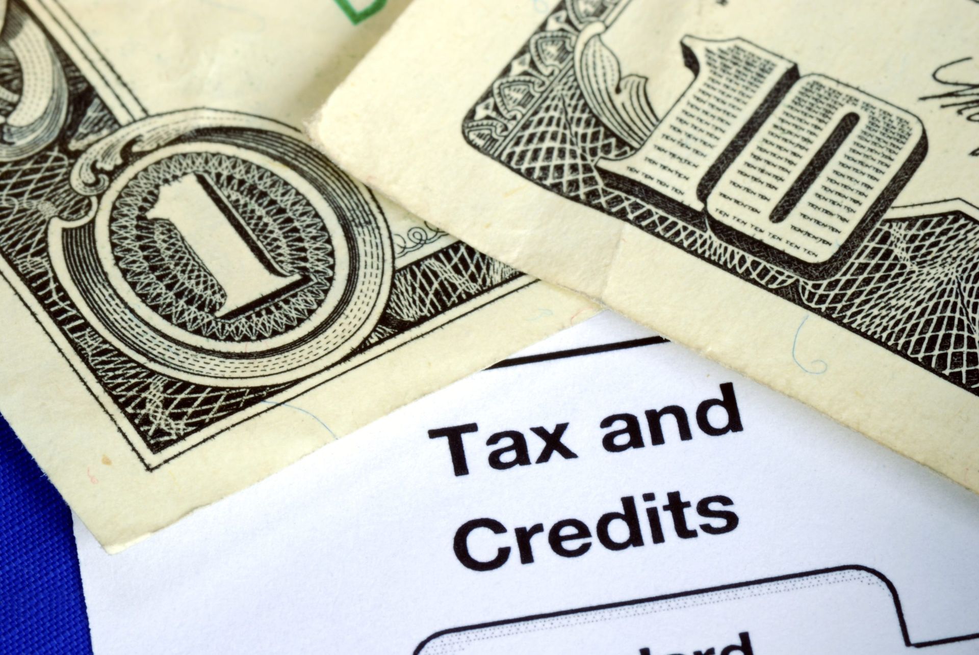 Looking through the vents of an AC unit a fan blade stays motionless