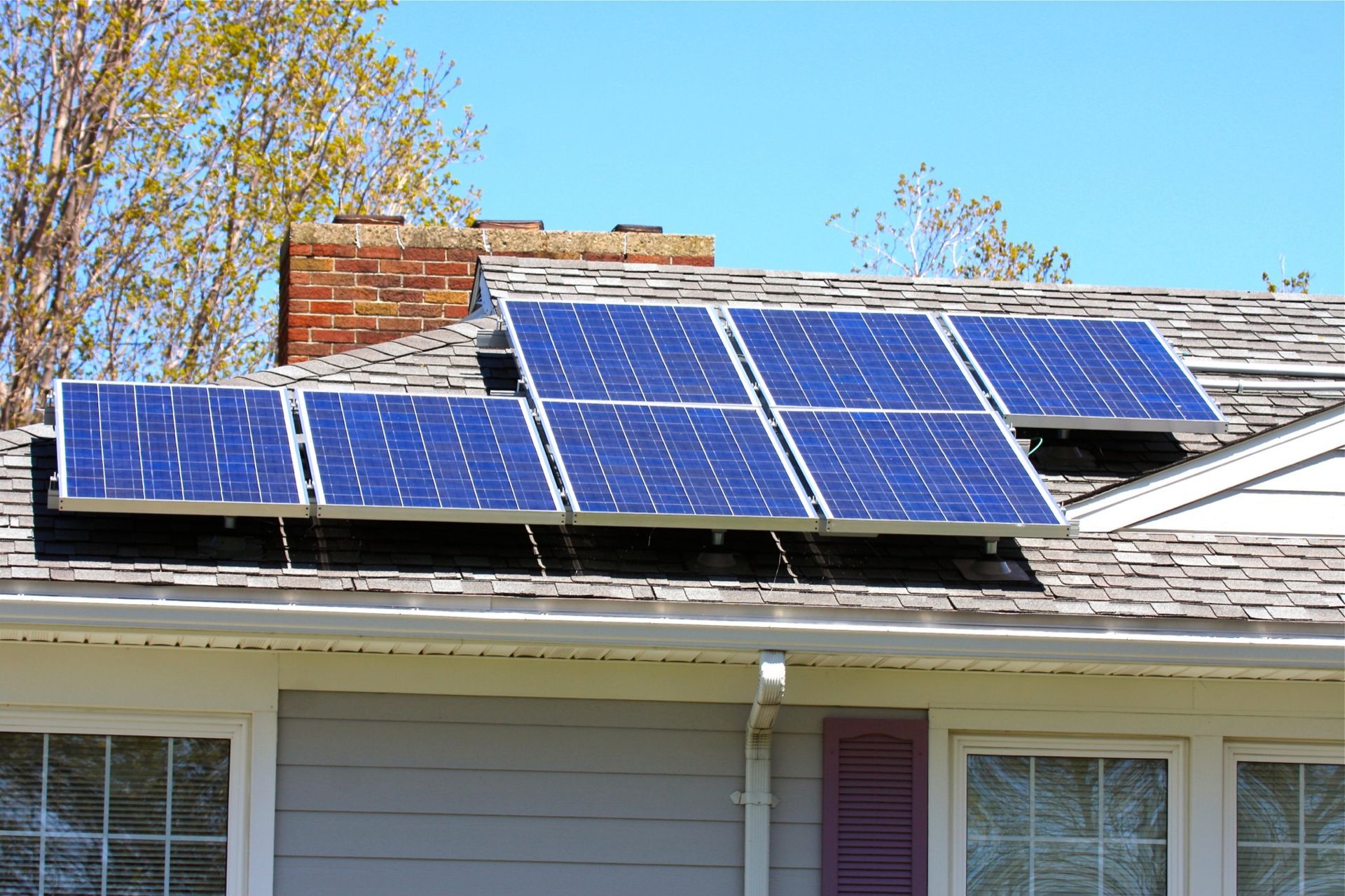Looking through the vents of an AC unit a fan blade stays motionless