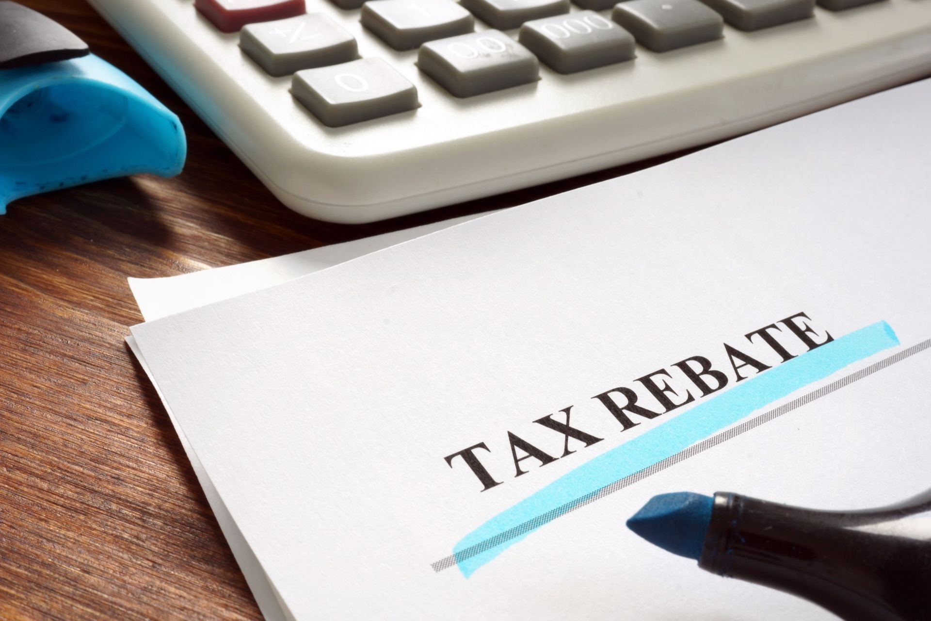 Looking through the vents of an AC unit a fan blade stays motionless