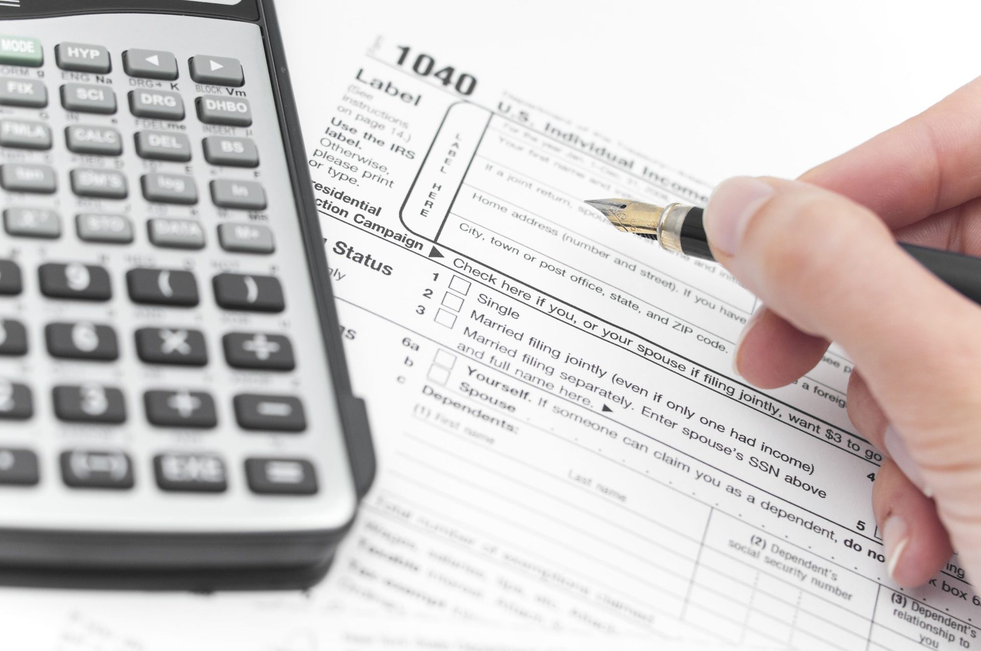 Side view of thermostat with person adjusting temperature