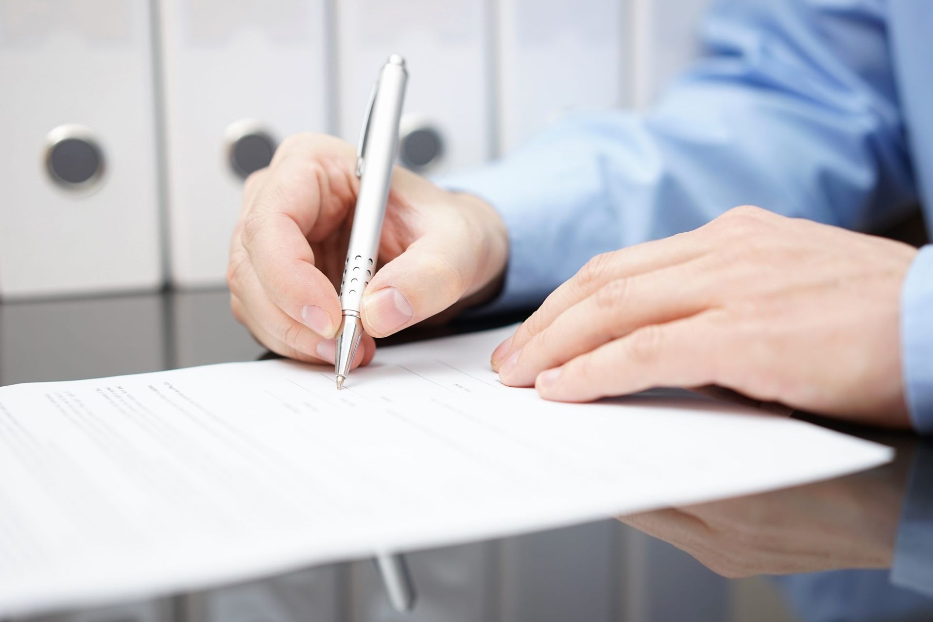 dreamstime_xxl_52555558 Looking through the vents of an AC unit a fan blade stays motionless