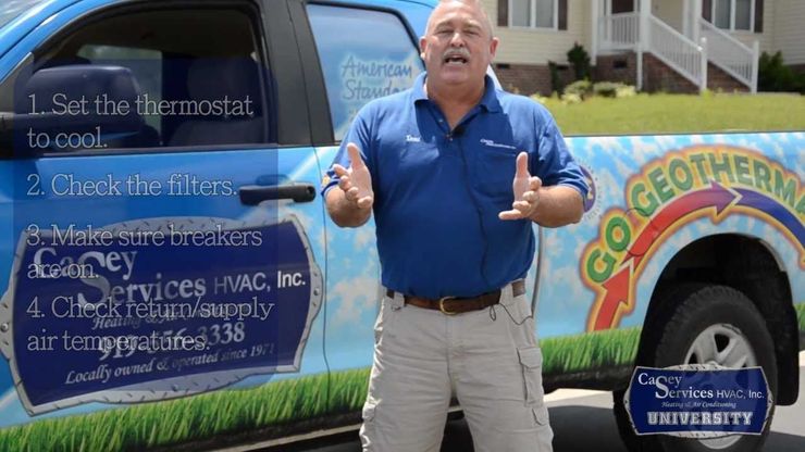 Man standing by truck with HVAC tips: set thermostat to cool, check filters, check breakers, check air temp.