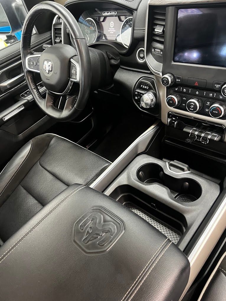 A close up of the interior of a dodge ram truck.