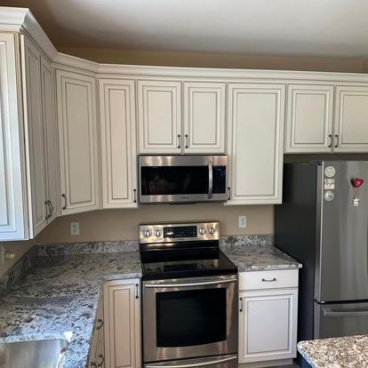 A kitchen with a large island in the middle of it.