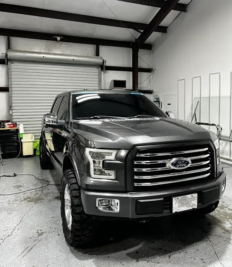 Ford F-150 auto glass replacement near Livingston, LA