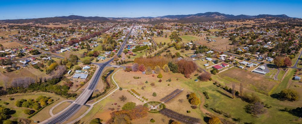 An Aerial View of a Small Town Surrounded by Fields and Trees — Gardners Yamba Skip Bin Hire in Townsend, NSW