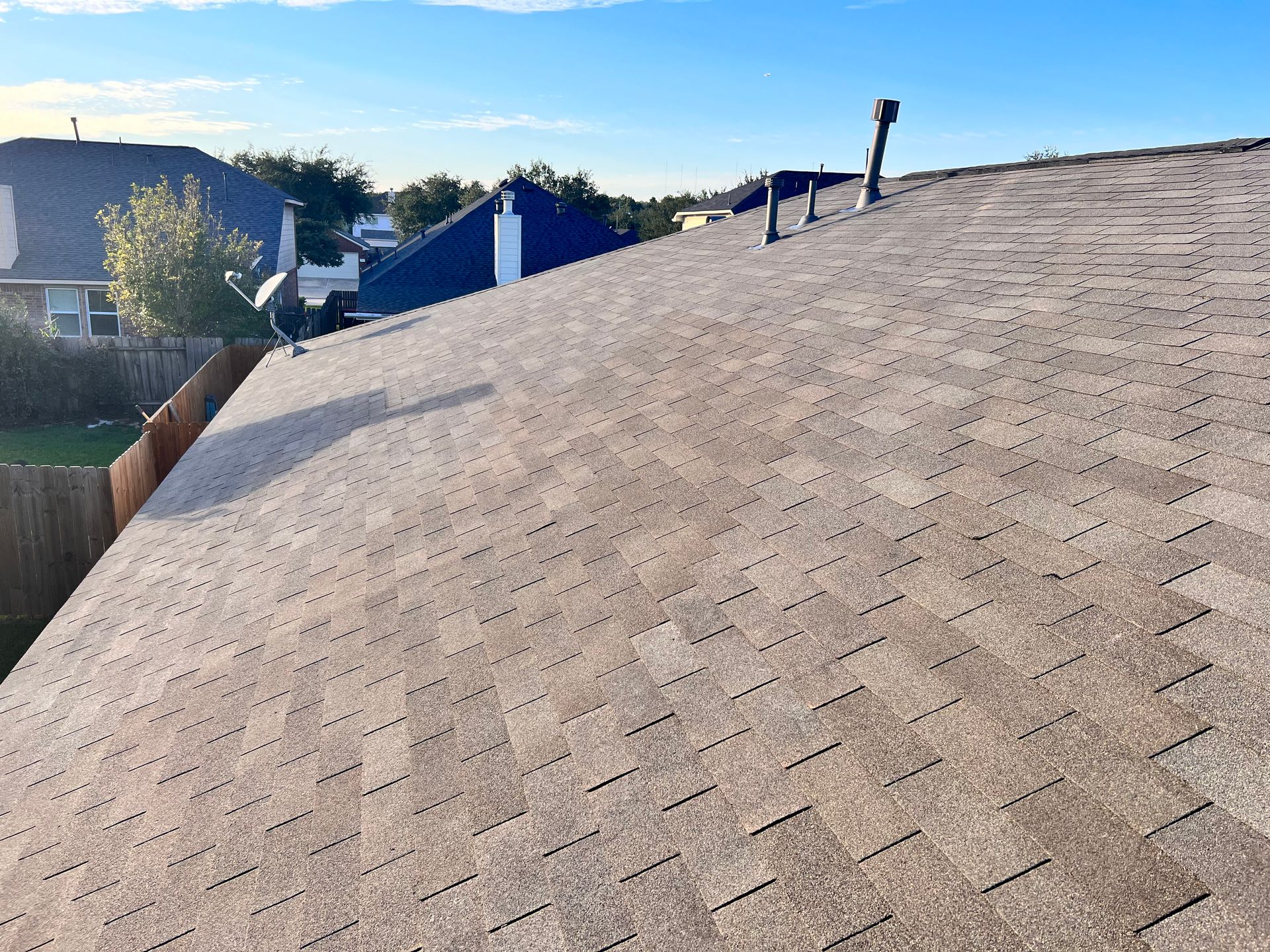 A brown asphalt shingle roof replacement