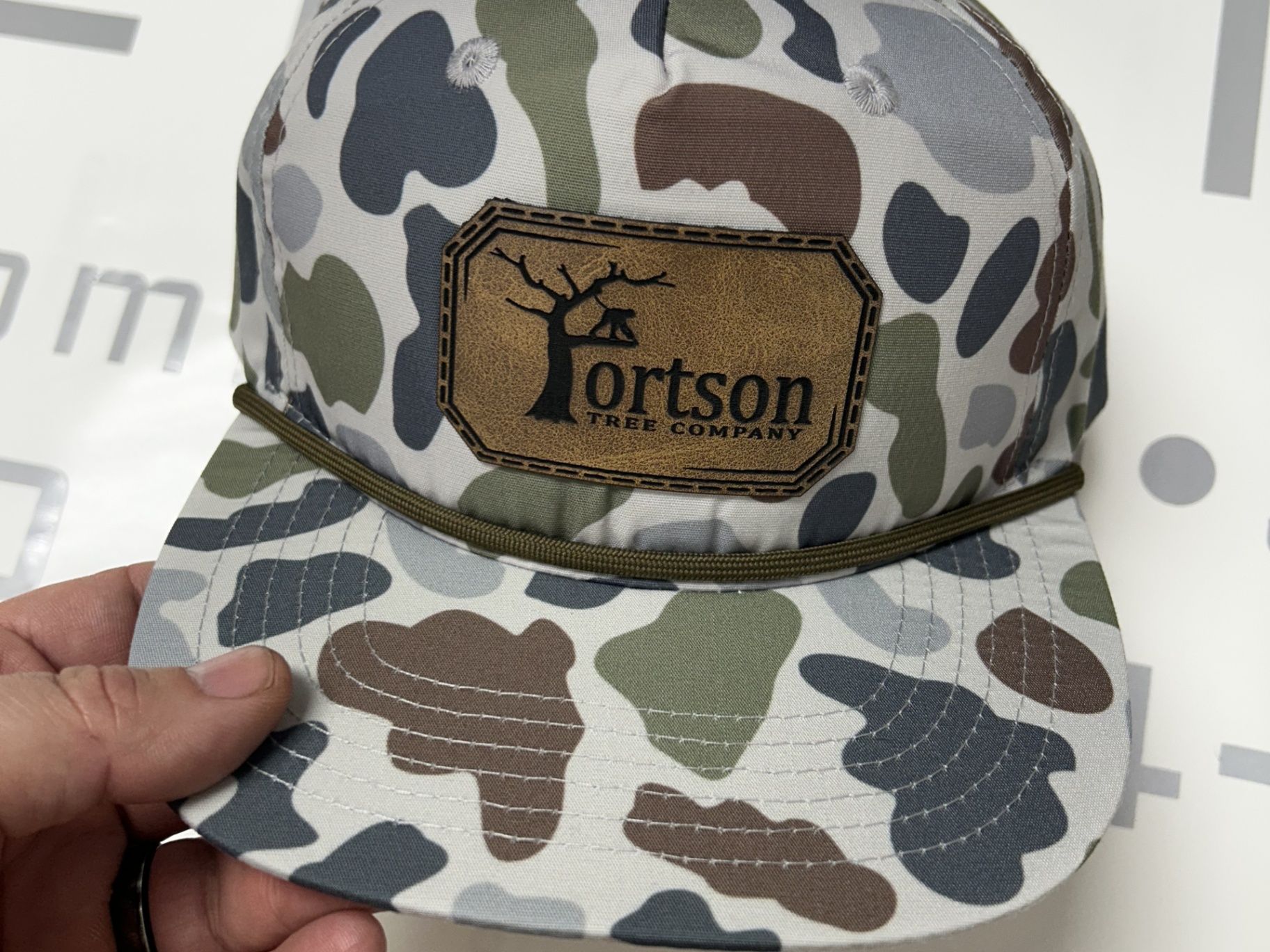 Brown baseball cap with 