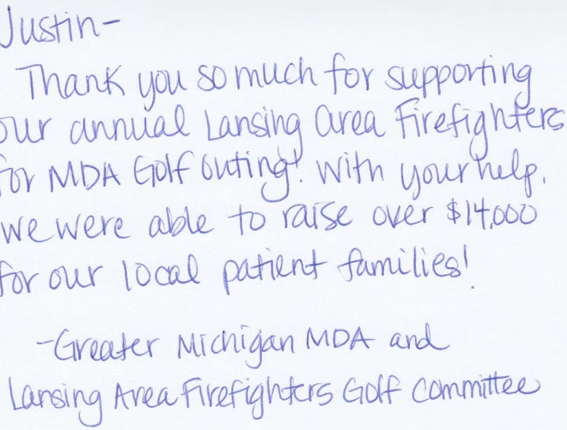 A handwritten thank you note to Justin from the Greater Michigan MDA and Lansing Area Firefighters for raising $14,000.