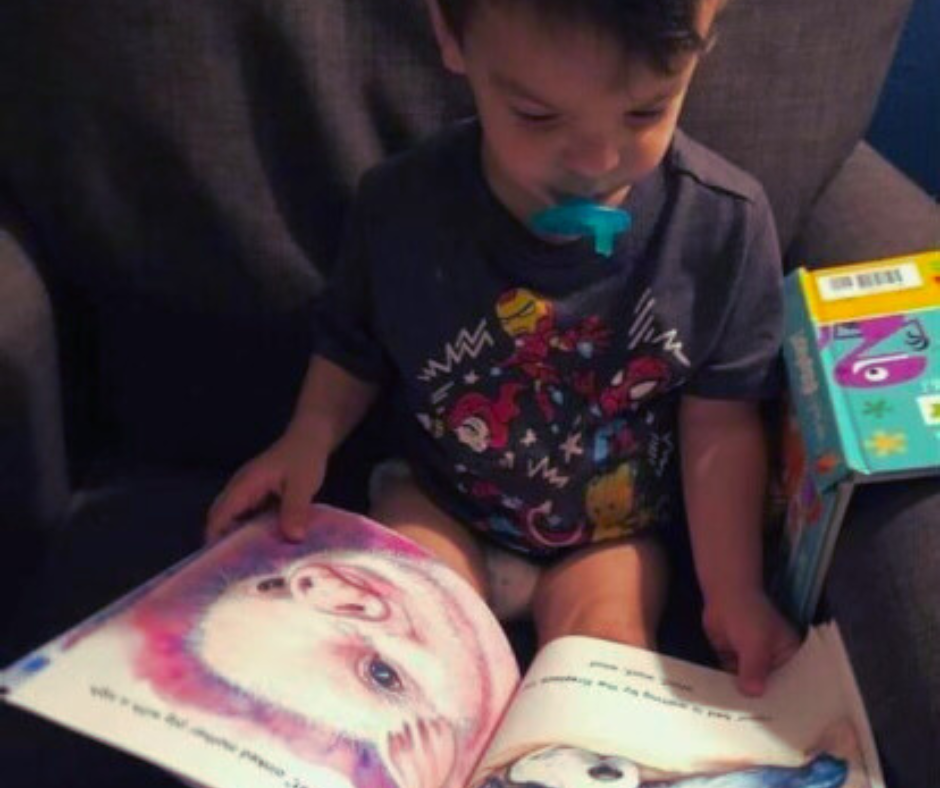 Child reading Frolicking Farmyard Friends