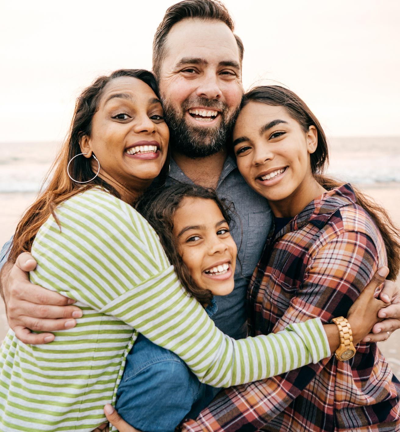 Family Hugging Together — Oak Forest, IL — The Genesis Therapy Center