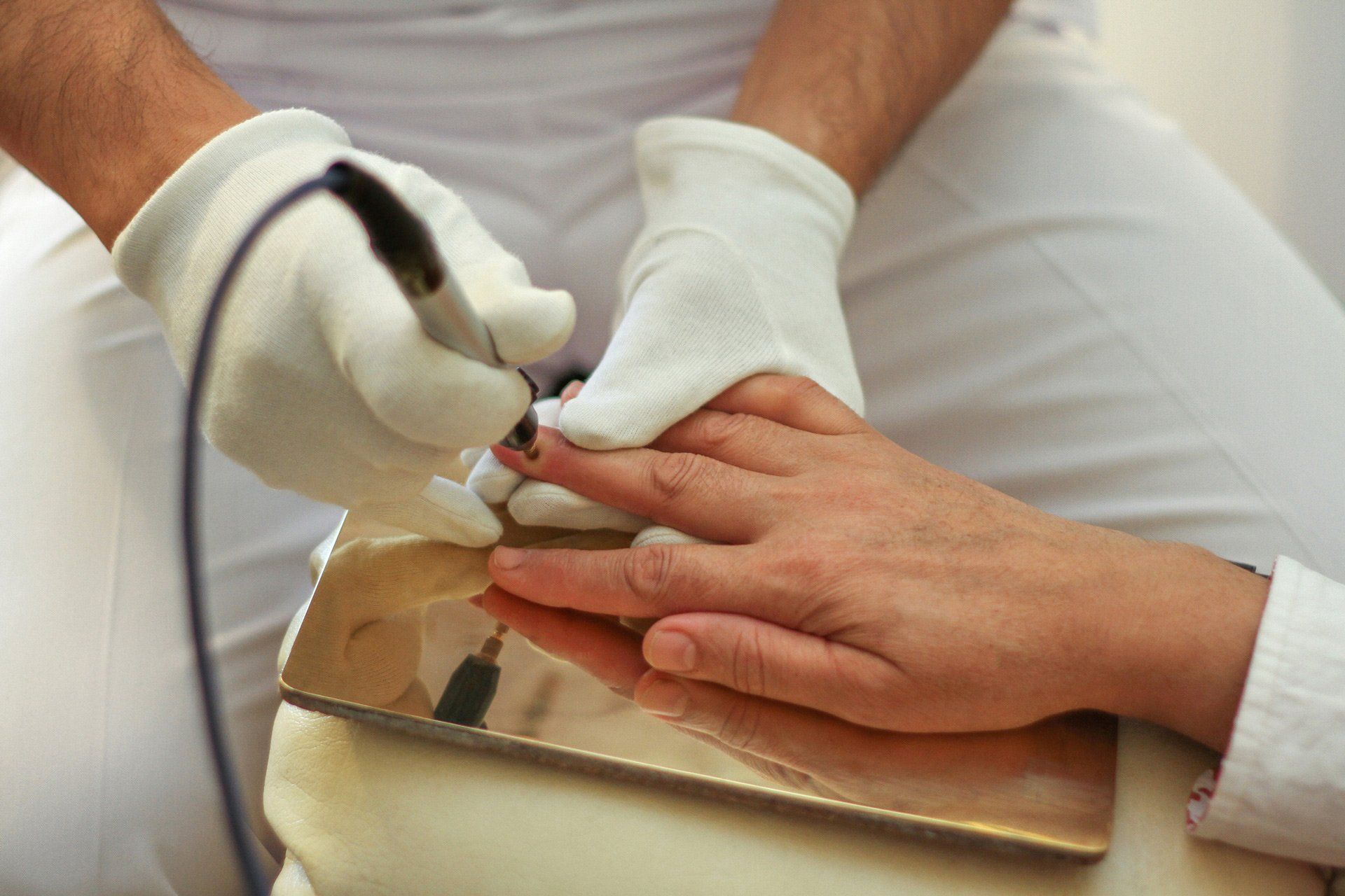 Person Holding Wires, Feet on Plates — Dive Chiropractic in Mermaid Beach, QLD