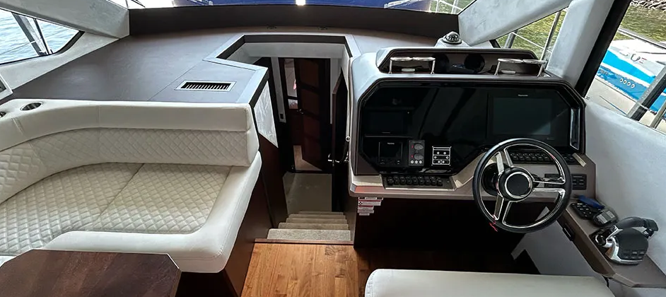 Cleaned interior of boat showing upholstery and floor 