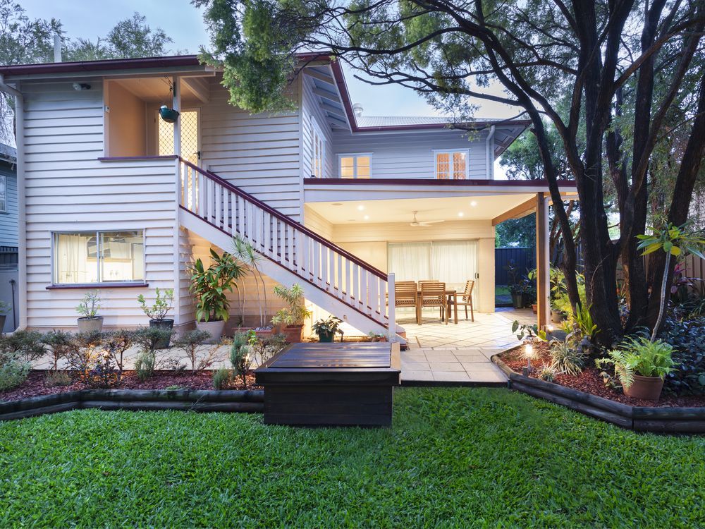A White House With Stairs Leading Up to the Second Floor — Karlene's Conveyancing In Kariong, NSW